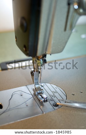 Closeup on industrial sewing machine