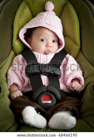 Baby girl in car seat