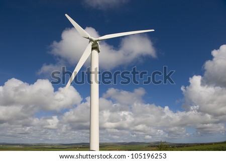 Wind turbine against the cloudy British sky. This is in Cornwall.
