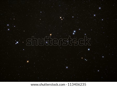 Real photograph of stars in the night sky with bright stars. Ideal as a background.