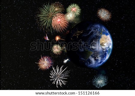 Global celebration. Fireworks surround the Earth. Street lights visible on the dark side of the planet and stars in the background. Elements of this image furnished by NASA.