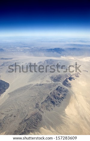 High altitude view of the Earth in space. The desert in the western United States.
