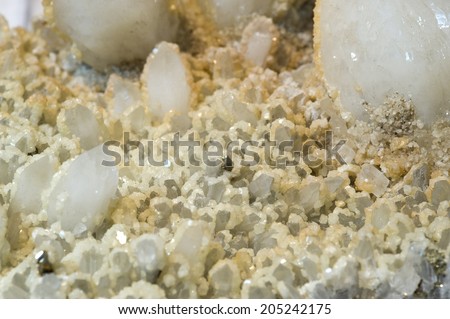 MUSEUM MINERAL SERIES: Calcite crystals covered in quartz.