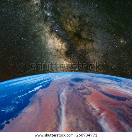 Libya from space with the Milky Way above. Elements of this image furnished by NASA.