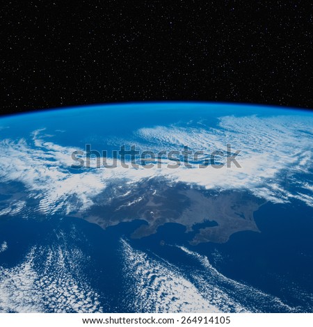 Japan (Tokyo area) from space with stars above. Elements of this image furnished by NASA.