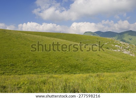 Rolling, grassy hills in the Lessinia mountains, near Verona, Italy.