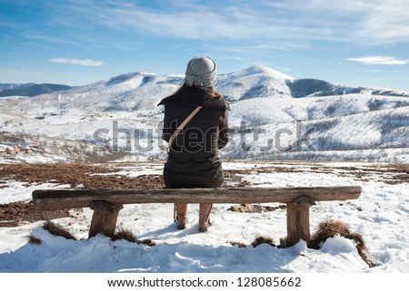 Relaxing at winter mountain landscape