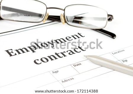 employment contract document form with pen and glasses