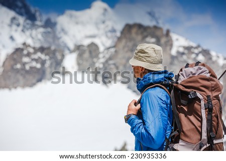hiker looking at the horizon in European Alps