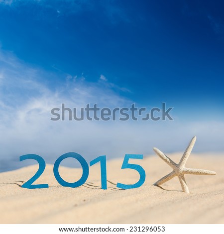 tropical beach and 2015 happy new year. Season vacation snd new year concept