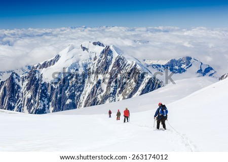 Climbers on the glacier in beautiful mountain nature landscape