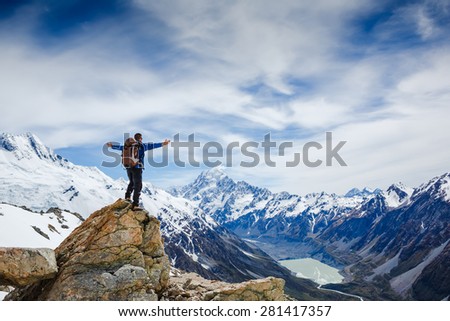Hiker on the mountain top. Sport and active life concept