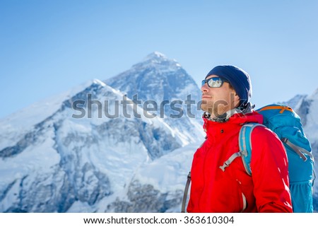 Hiking in Himalaya mountains. Face to face with mount Everest, Earth\'s highest mountain. Travel sport lifestyle concept
