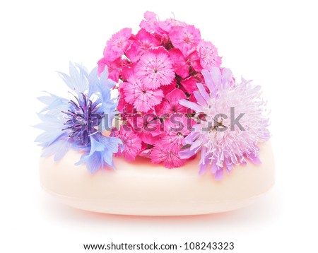 flower bouquet and soap on a white background