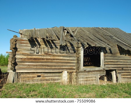The old thrown house in village in the spring. Karelia, Russia
