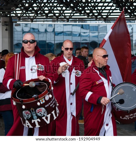 MINSK, BELARUS - MAY 15 - Latvian Fans near Minsk Arena on May 15, 2014 in Belarus. Ice Hockey World Championship (IIHF)