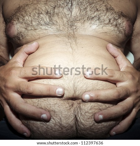 belly fat and hairy man with hands