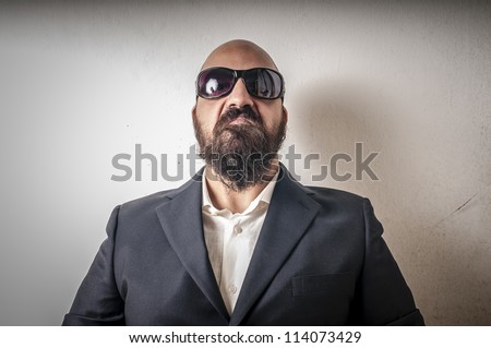 bouncer with jacket and sunglasses on white background