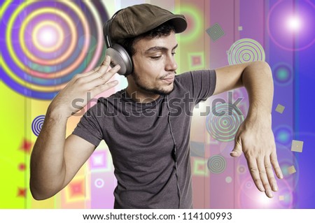 Crazy guy with headphones on colorful background