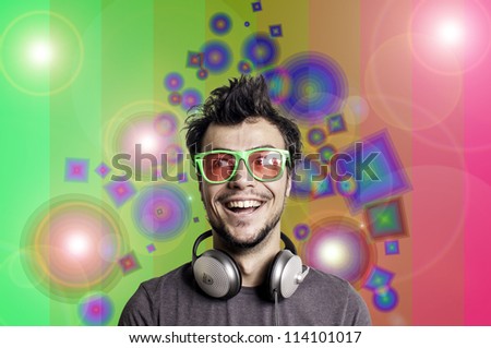 Crazy guy with headphones on colorful background
