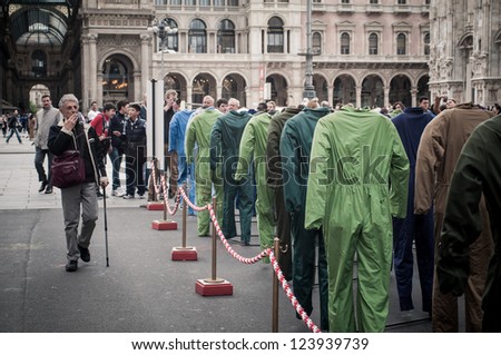 MILAN, ITALY - APRIL 23: art installation by Gianfranco Angelico Benvenuto in Milan on April, 23 2012. Installation '100 Sogni morti sul lavoro' exposed in honor of dead on work in Milan Piazza Duomo