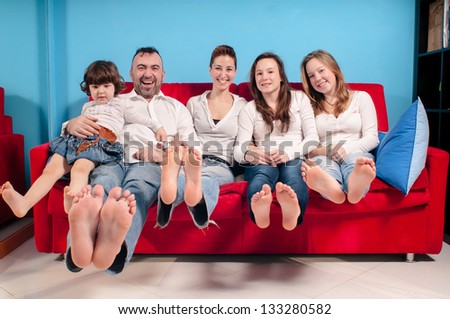 happy family on the couch in the living room