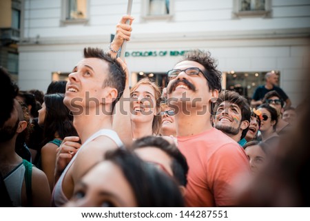 MILAN, ITALY - JUNE 29: Gay Pride Parade & Celebration in Milan June 29, 2013. Participants take to the street for their rights organizing a street parade party