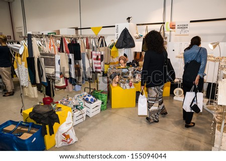 MILAN, ITALY - SEPTEMBER 20: So Critical So Fashion exhibition in Milan on September, 20 2013. Alternative fashion exhibition of biological, vegan and recycled materials during Milan Fashion Week
