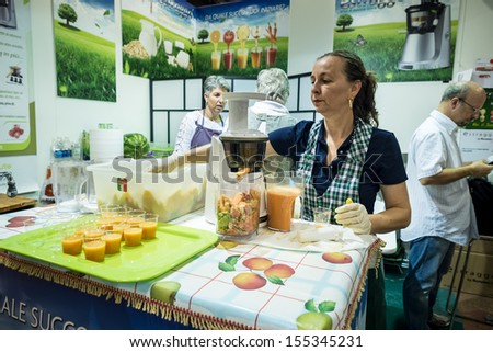 BOLOGNA, ITALY - SEPTEMBER 8: Vegan Fest on September 8, 2013. Thousands of people visited the fair vegan fest where were presented vegan biological products, vegan cook and animal rights convention.