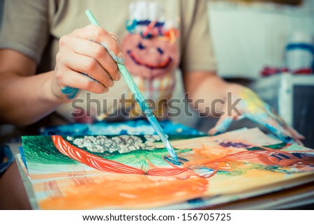 Particular Of Woman Painter Hand Painting In Her Studio