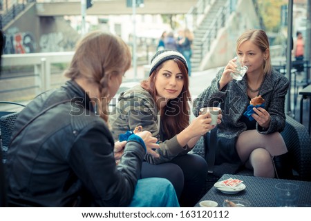 three friends woman at the bar in urban contest