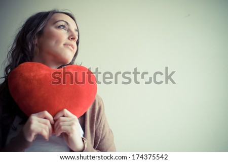 beautiful woman at home with heart for valentine's day beautiful woman at home with heart for valentine's day