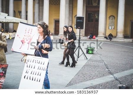 MILAN, ITALY - MARCH 21: 269 Life protest on March 21, 2014. People shocked looking at 269 activists performance  against animal abuses and pro vegan lifestyle