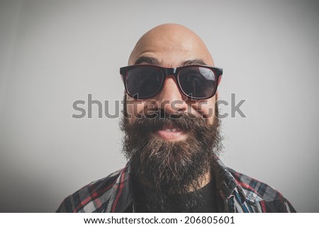hipster long bearded and mustache man with shirt squares