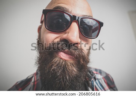 hipster long bearded and mustache man with shirt squares