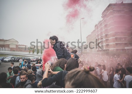 MILAN, ITALY - OCTOBER 10: Students manifestation held in Milan on October, 10 2014. Students took to the streets to protest against school italian reform and against milan expo