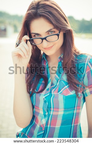 beautiful young hipster woman in the city