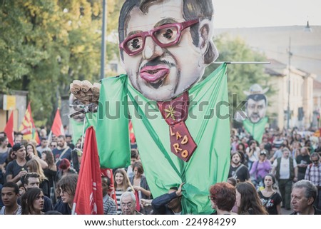 MILAN, ITALY - OCTOBER 18: manifestation held in Milan october 18, 2014. People took streets to protest against racism, war and against lega nord, right wing politic italian movement