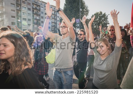 MILAN, ITALY - OCTOBER 18: A manifestation held in Milan october 18, 2014. People took to the streets to protest against racism, war and against Lega Nord, an Italian right wing political movement.