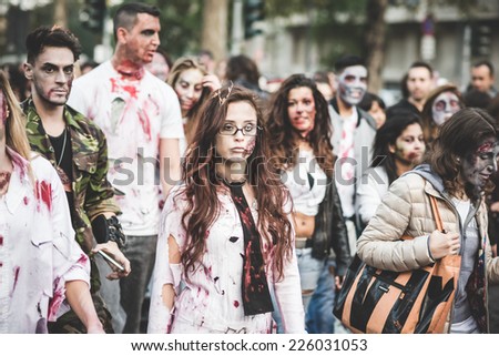 MILAN, ITALY - OCTOBER 25: Zombie parade held in Milan October 25, 2014. People took to the streets of Milan masked as zombie monsters for the next halloween holiday.