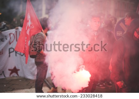 MILAN, ITALY - NOVEMBER 14: Student demonstration held in Milan November 14, 2014. Students took streets to protest against Milan expo to be held in 2015, event important worldwide.