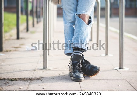 close up legs shoes young handsome hipster gay modern man in town