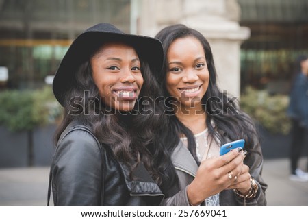 MILAN, ITALY - FEBRUARY 28: People during Milan Fashion week, Italy on February, 28 2015. Eccentric and fashionable people outside city during Milan fashion week wait for models and famous people