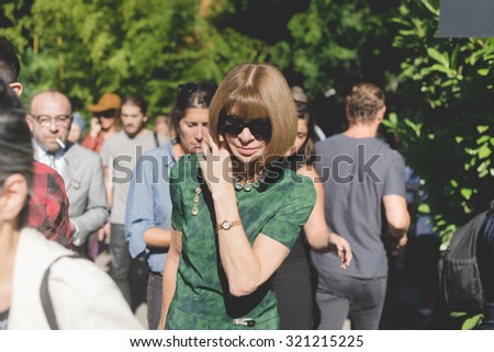 MILAN, ITALY - SEPTEMBER 24: People during Milan Fashion week, Italy on SEPTEMBER 24, 2015. Eccentric and fashionable people waiting for models and vips outside city during Milan fashion week