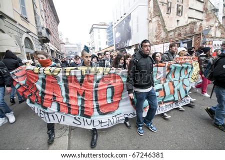 MILAN, ITALY - DECEMBER 14: student demonstration held in Milan December 14, 2010. Students protest against Berlusconi\'s government and against the new laws on school education minister Gelmini.