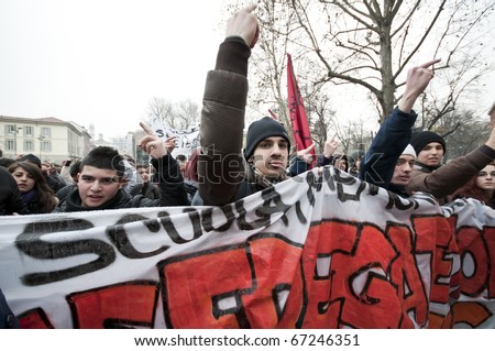 MILAN, ITALY - DECEMBER 14: student demonstration held in Milan December 14, 2010. Students protest against Berlusconi's government and against the new laws on school education minister Gelmini.