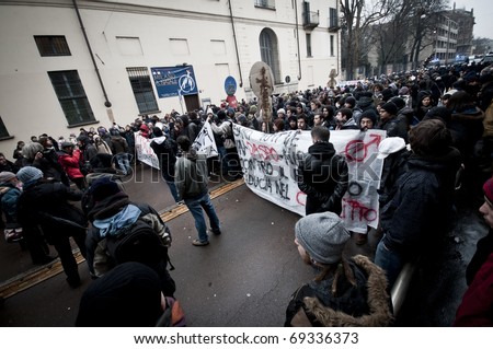 MILAN, ITALY - DECEMBER 22: student demonstration held in Milan December 22, 2010. Students protest against Berlusconi\'s government and against the new laws on school education minister Gelmini.