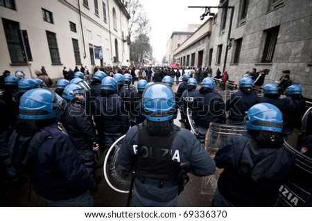 MILAN, ITALY - DECEMBER 22: student demonstration held in Milan December 22, 2010. Students protest against Berlusconi's government and against the new laws on school education minister Gelmini.