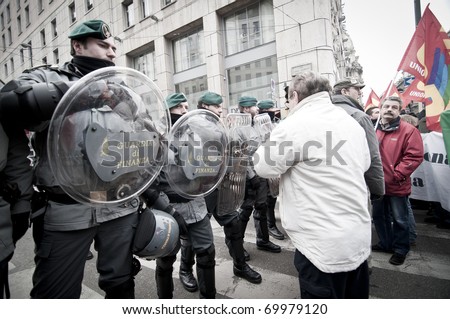 MILAN, ITALY - JANUARY 28: student demonstration held in Milan January 28, 2011. Students protest against Berlusconi's government calling for his resignation from the government.