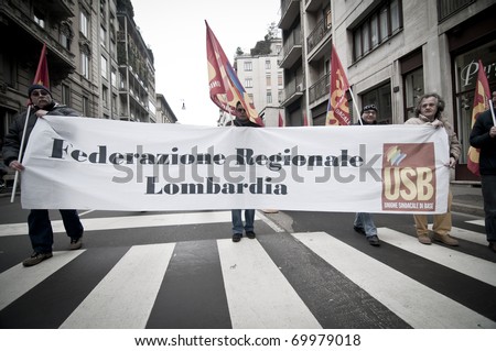 MILAN, ITALY - JANUARY 28: student demonstration held in Milan January 28, 2011. Students protest against Berlusconi\'s government calling for his resignation from the government.